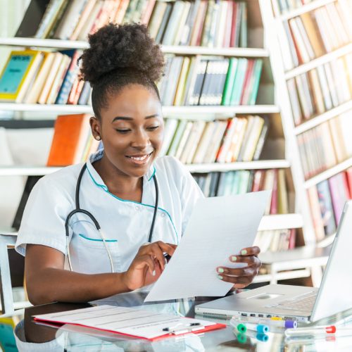 doctor working on a laptop computer